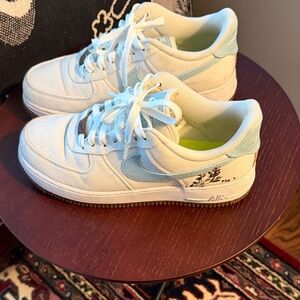 Nike White Sneakers with Light Blue Swoosh